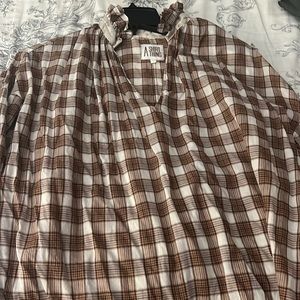 A shirt thing plaid shirt with ruffle collar. Cotton.